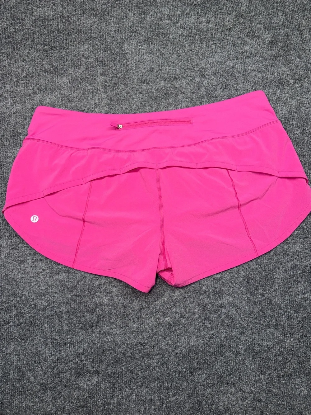 Lululemon Speed Up Shorts in the bright Sonic Pink colorway